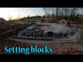 Laying The First Course Of Blocks