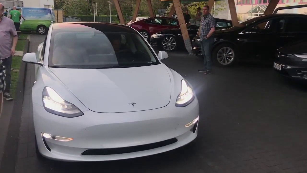 Tesla Model 3 with lights on YouTube