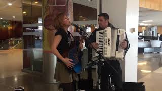 Accordion Virtuoso, Paul Stanga with Emily McVicker at Seatac Airport!