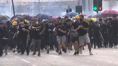 Hong Kong: Police fire tear gas & water cannons at anti-China protesters