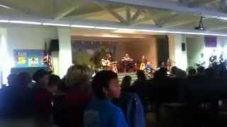 Uncle Jack aka Jack Johnson and Paula Fuga playing for Sunset Beach Elementary