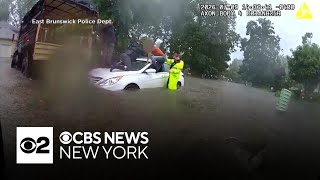 Dramatic video shows N.J. police rescue driver stuck on flooded road