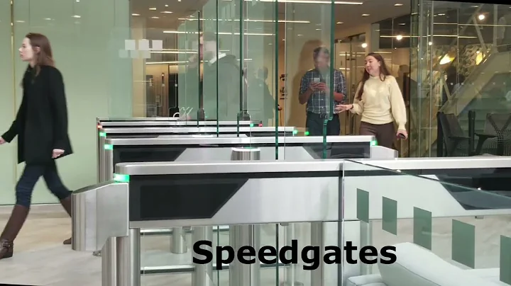 Speedgates swing glass optical turnstiles busy lobby