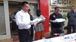 NET. JATIM - POLISI UNGKAP PRAKTIK PEREDARAN UANG PALSU