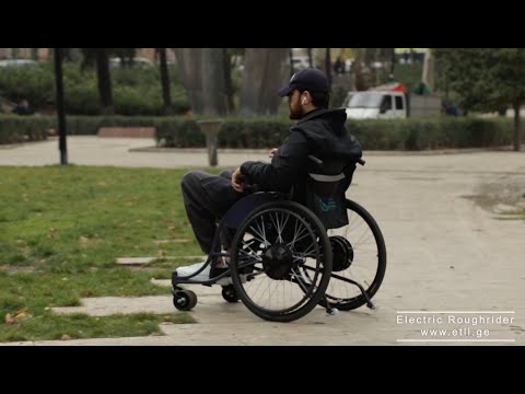 electric wheelchair \'RoughRider\' in outdoor environment  / ელექტრო ეტლი \'რაფრაიდერი\' გარე პირობებში