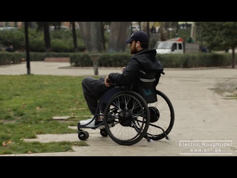 electric wheelchair \"RoughRider\" in outdoor environment  / ელექტრო ეტლი \"რაფრაიდერი\" გარე პირობებში