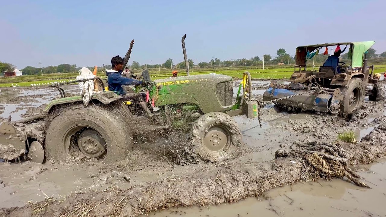 Tracktor Stick John Deere tractor stuck in mud Rescued by Swaraj tractor | tractor ...