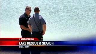 Granddad saves youngster from van rolling into lake