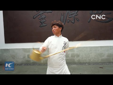 Trending China: A master of long-spout-pot tea ceremony