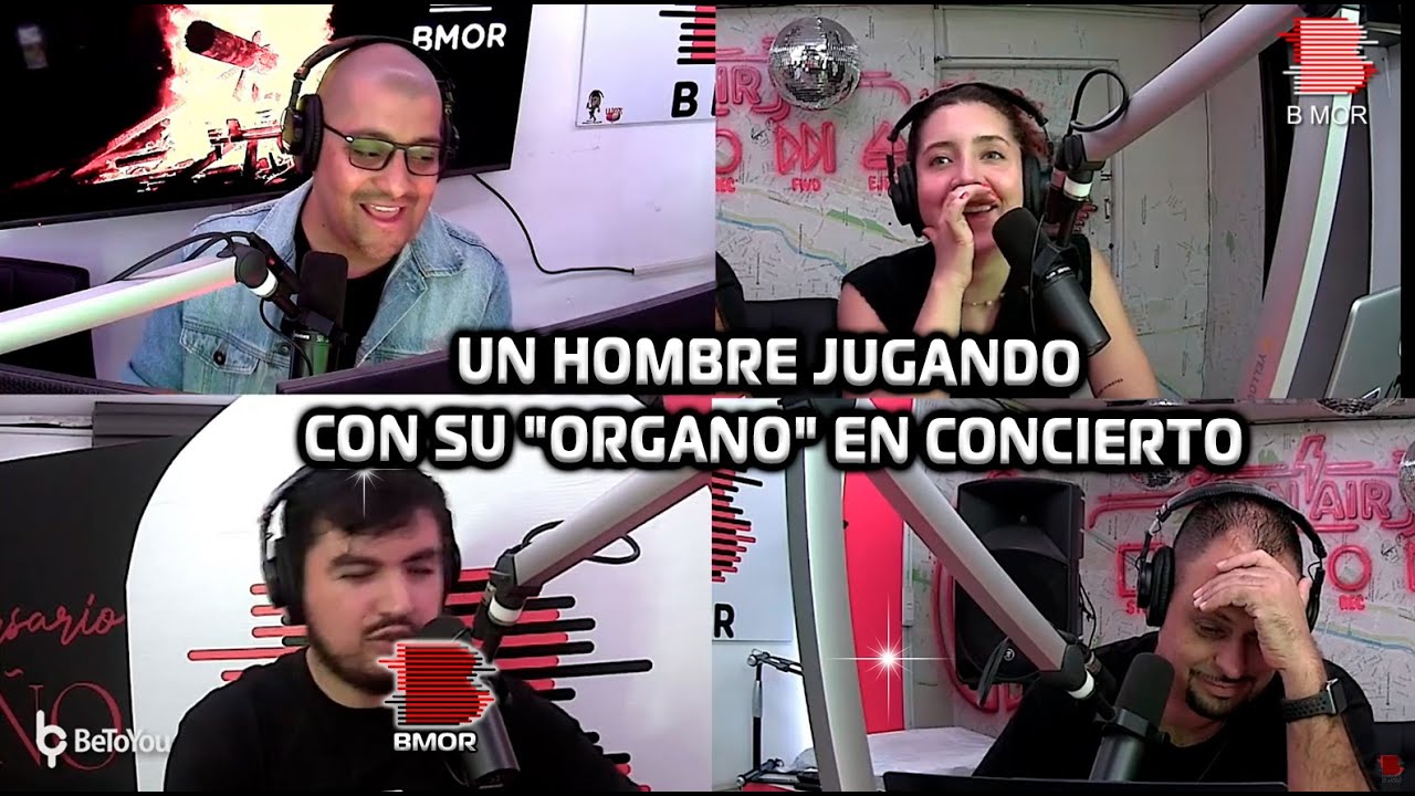 UN HOMBRE JUGANDO CON SU "ORGANO" EN CONCIERTO. 