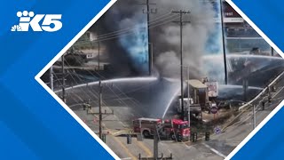 Crews working for hours to extinguish large fire near East Marginal Way