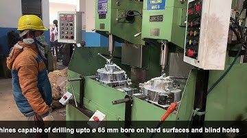 Servo controlled dual spindle drilling machine