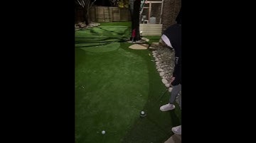 Testing out the new turf putting green