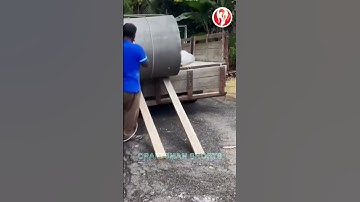 Cement Pipe | The process of manually unloading cement pipe from a truck