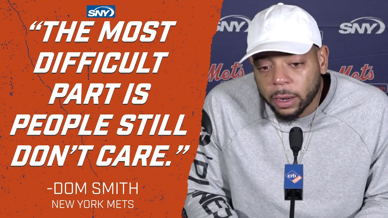 An emotional Dom Smith speaks after deciding to kneel for the