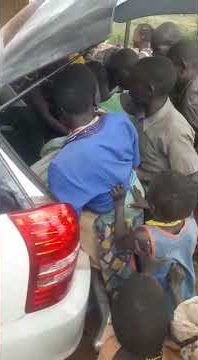 A business man in moroto known as Obama donates food to karimajongs in the vilages of Kambizi