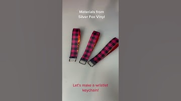 A wristlet keychain made with #fauxleather and #siserholographic #firelitpearl #heattransfervinyl #h