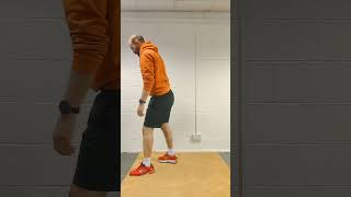 Squat jump with step back