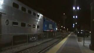 Metra 107 arrives and departs northbrook illinois at night