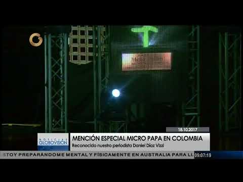 Momento en el que Daniel Díaz Vizzi recibe premio Monseñor Pellín