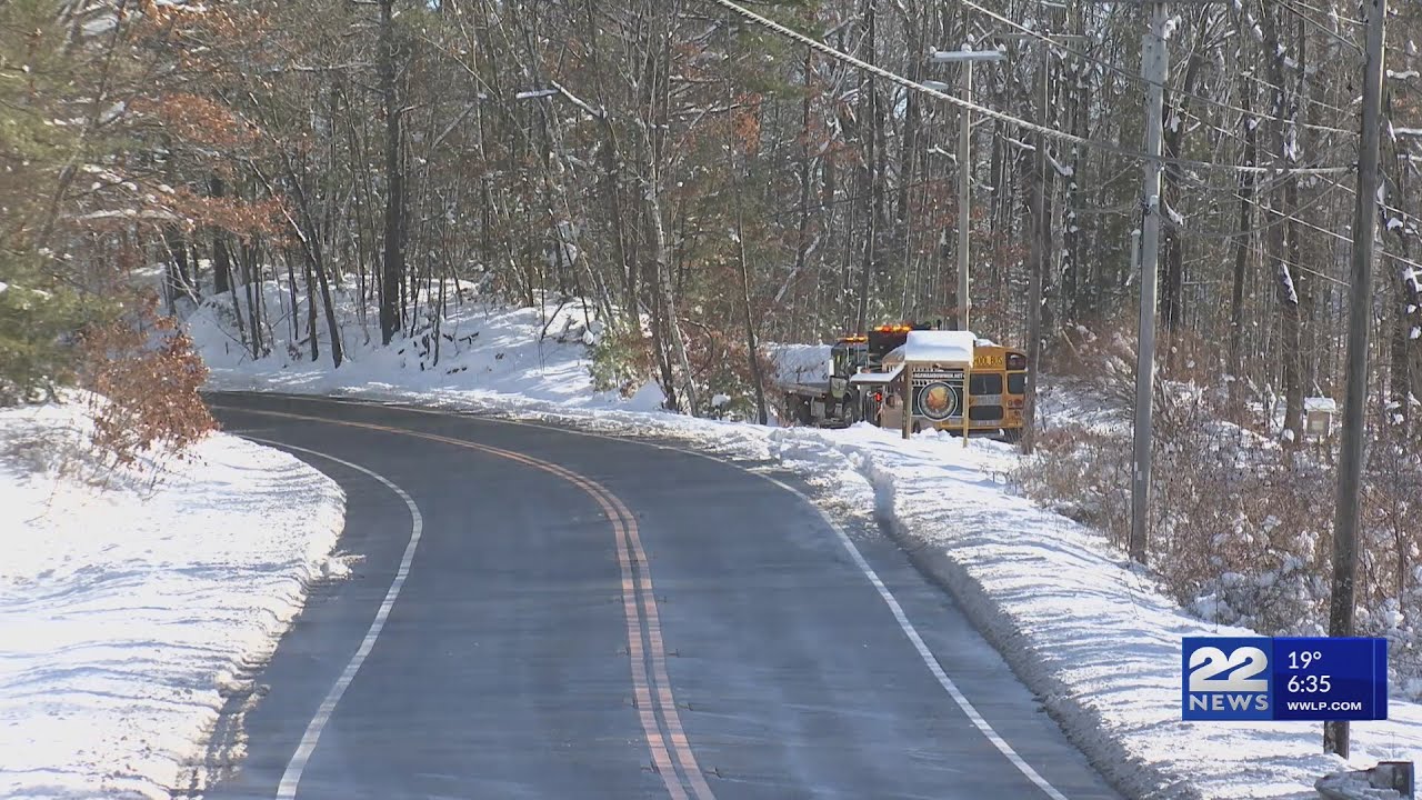 School bus slides down embankment off Route 57 in Southwick - YouTube