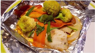 Filete de pescado con verduras en aluminio