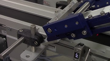 Automatic Labeling of Hand Sanitizer Bottles with LabelMill LM4005 Wipe-On Applicator