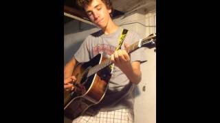Thackery playing the guitar