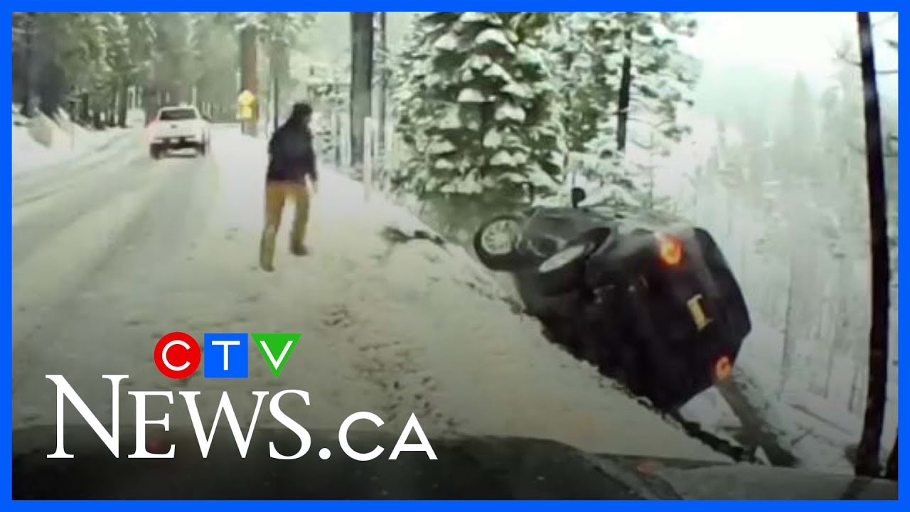 Good Samaritan rushes to help after vehicle nearly slides down snowy ...