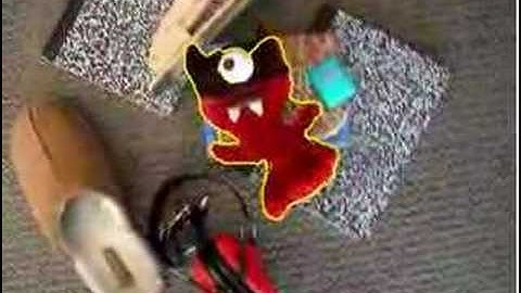 Graph cut tracking with priors