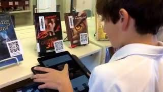 QR reader opens book trailers on iPads in Garzon Library