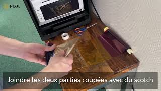 ROULEAU D'ENCRE DÉCHIRÉ - IMPRIMANTE DNP620