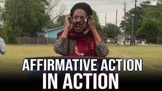 Congresswoman Jackson Lee STRUGGLES to put her eclipse glasses in EMBARRASSING display