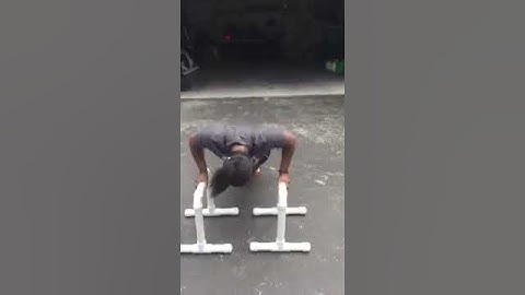 Push ups on parallel bars