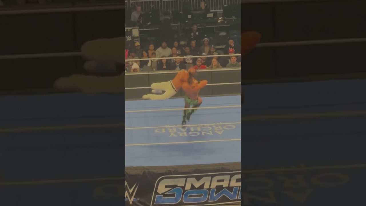 Huge Clothesline from Andrade to The Miz 