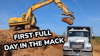 Trucking Base Rock with John Deere Excavator and Mack Dump Truck