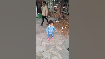 Interrupting her conversation with her friends