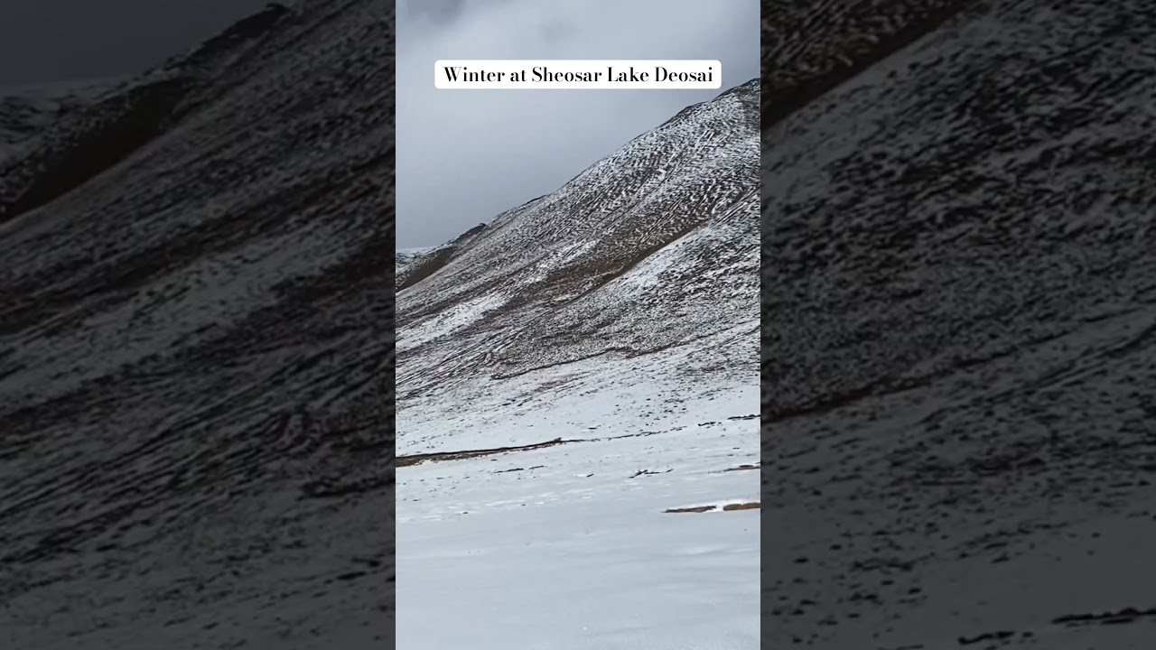 Sheosar lake surrounded by snow 