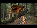 Bushcraft Survival. Building a Shelter by a Fallen Tree to Escape Bad Weather &amp; Wild Animals.