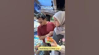Kak Yatie Shopping for Household Needs at Ben's Grocer