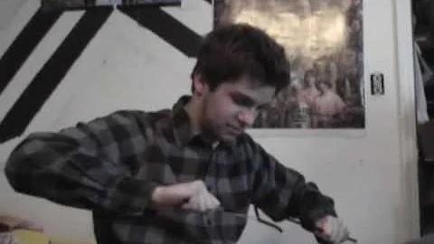MacGyver (Nathan Guidry) opens a new phone