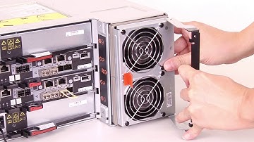 Lenovo ThinkSystem DE Series 4U enclosure installing a fan