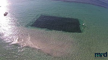 Placement of Rubble-Mound Breakwater Foundation