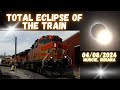 Filming a busy line in muncie indiana during the eclipse wide load old emd on 2 mile long train
