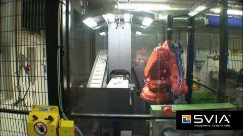 FlexLoader™ FP 300 with ABB robot feeding brass parts to machine that coats threads