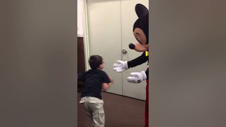 Autistic Boy Meets Mickey Mouse