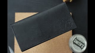 :        / Stitching leather by hand