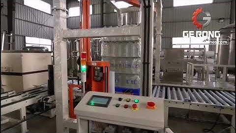 Water bottle pallet shipping cargo stretch film wrapping sealing packing machine running video