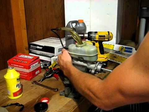 Bench bleeding master cylinder - YouTube