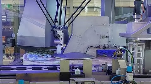 Delta Robot Bottle Unscrambler with 1 robot - Standard unscrambler with bottle orientation